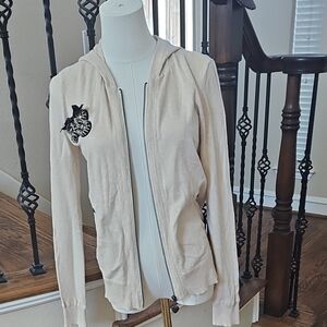 Twisted Heart Cream Knit Apparel